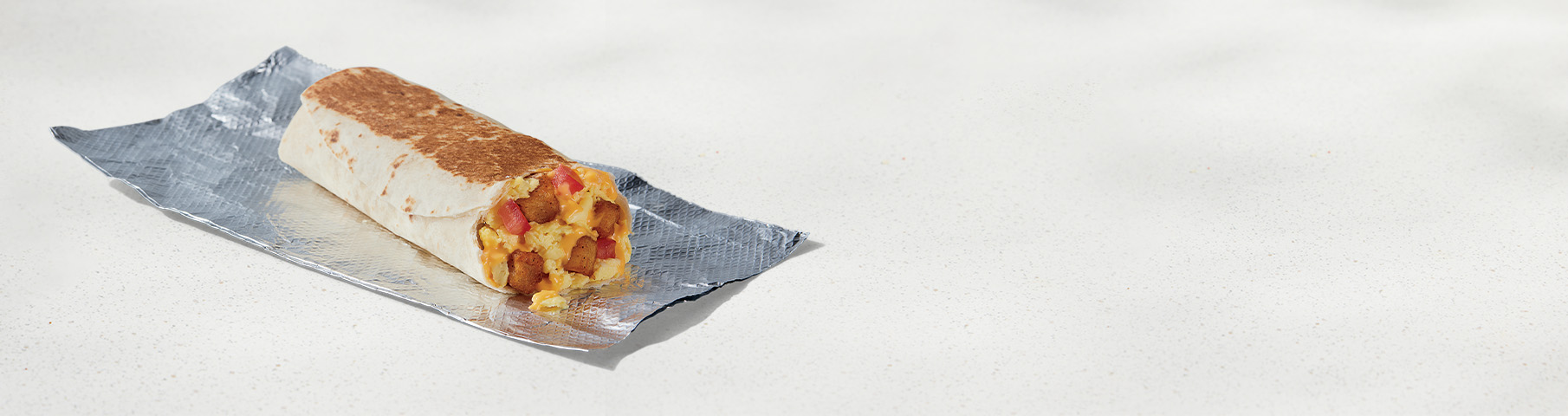 Cheesy Toasted Breakfast Burrito Potato